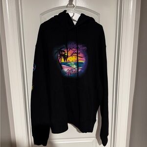 Kappa Black Hoodie with Vibrant Sunset Graphic